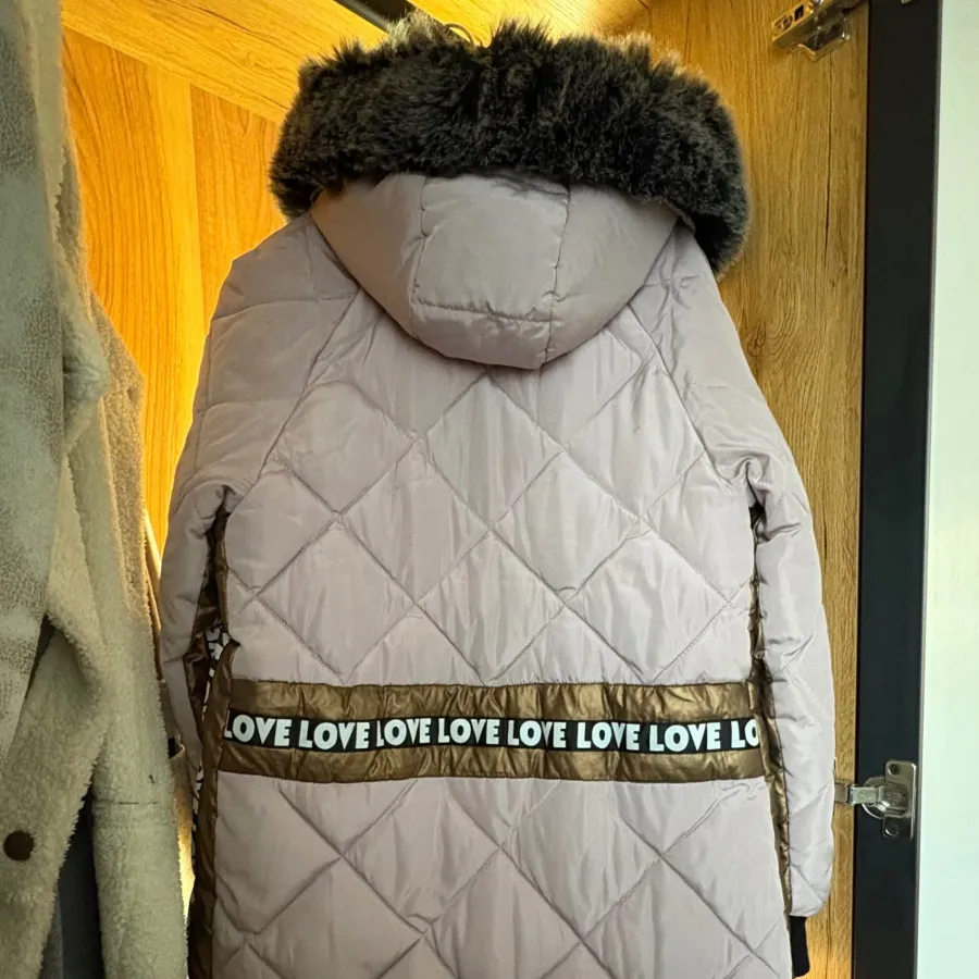 کاپشن بلند صورتی