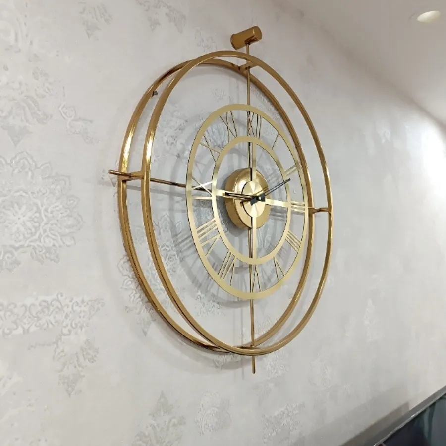 ساعت دیواری طلایی مدرن