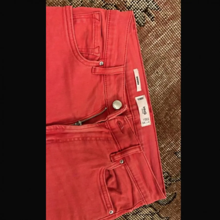 شلوار جین منگو mango