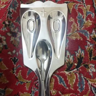 زیر قاشقی کنار گاز استیل