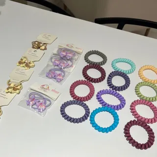 کش مو بچگانه و سیم تلفنی