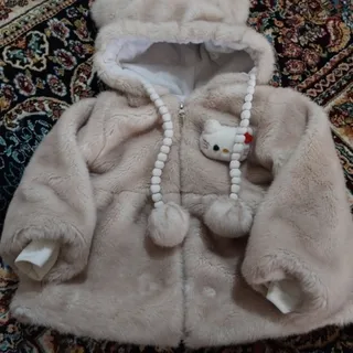 کاپشن عروسکی پشمالو