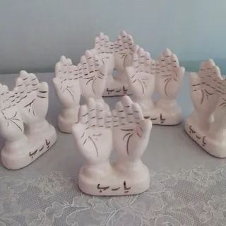 مجسمه قدیمی دعا