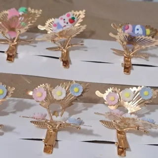 گیره فلزی طلایی پروانه