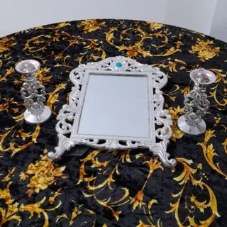ایینه و شمعدان