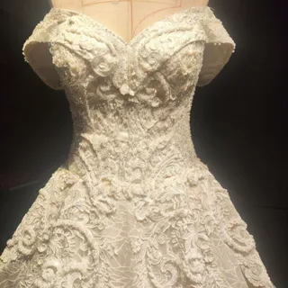 لباس عروس مهره دوزی شده