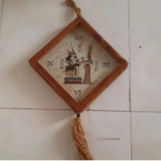 ساعت دیواری چوبی