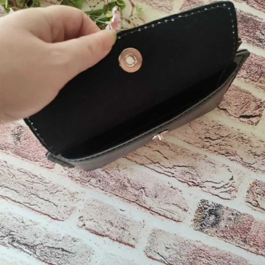کیف پول دستدوز