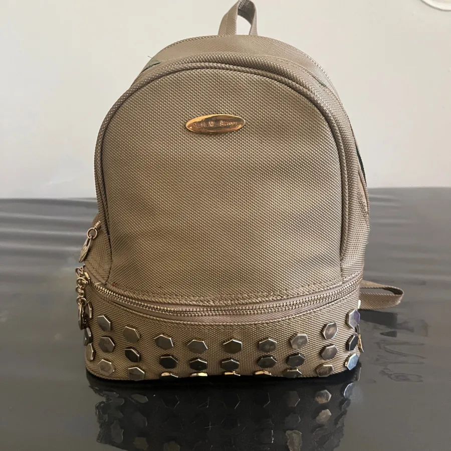 کیف کوله پشتی بژ ترک