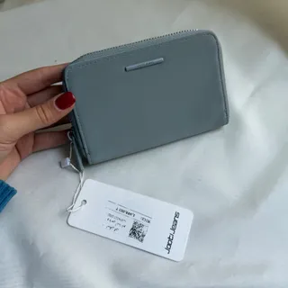 کیف پول جین وست