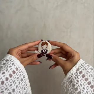 کش مو دستدوز