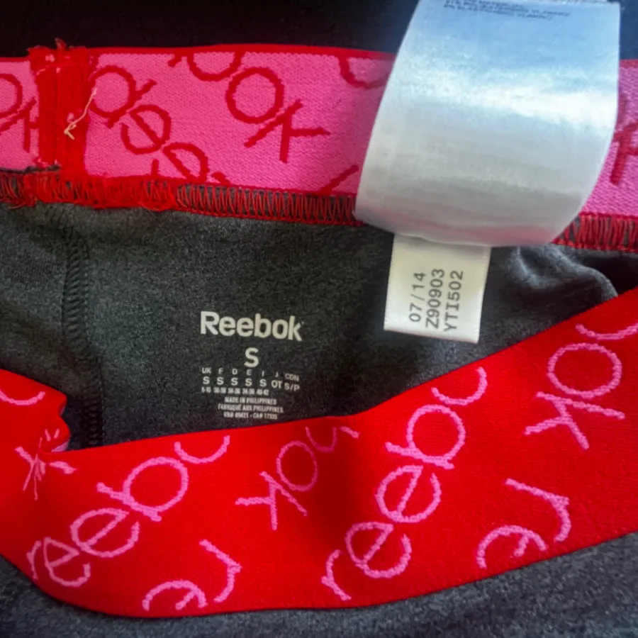 شلوارنیم زیپ رانینگreebok