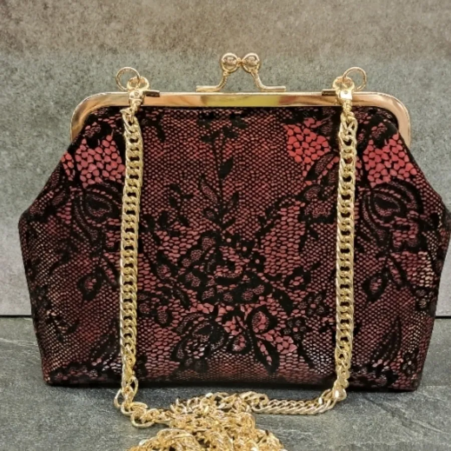 کیف دستدوز دهانه فلزی