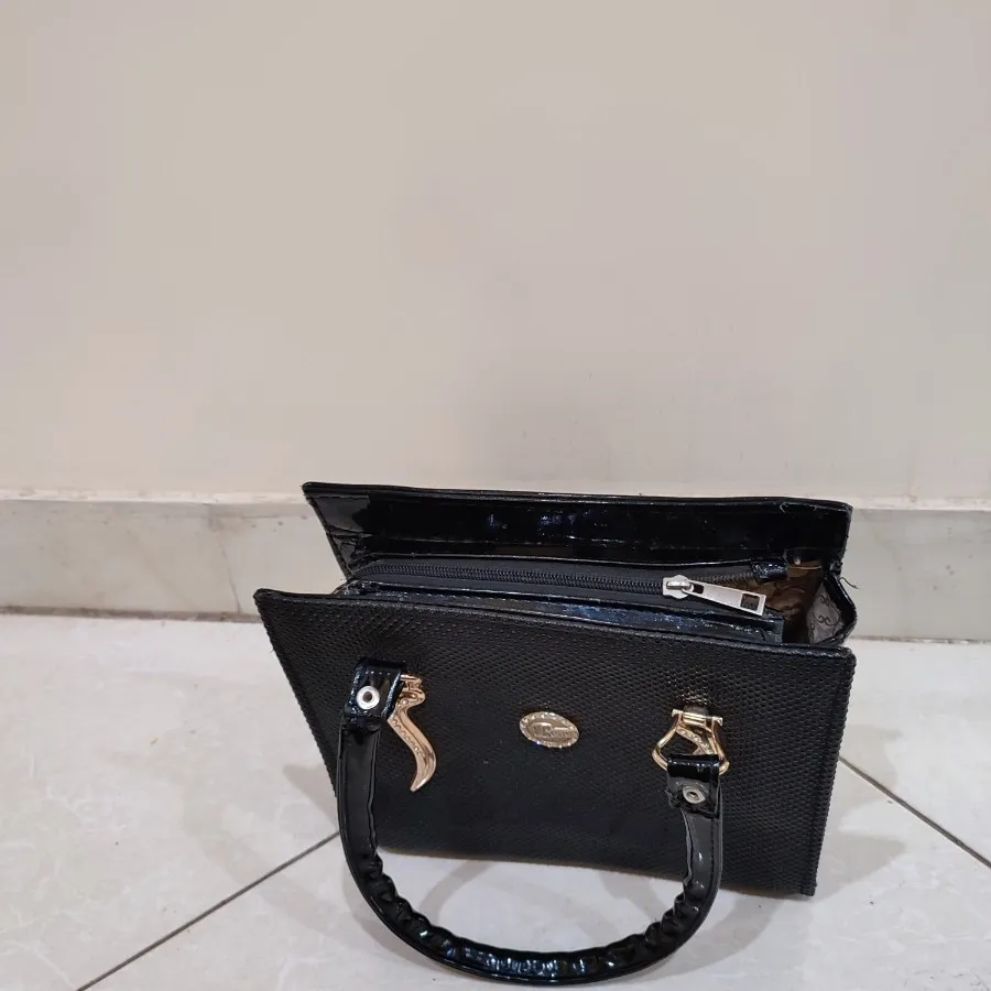 کیف چرم ورنی