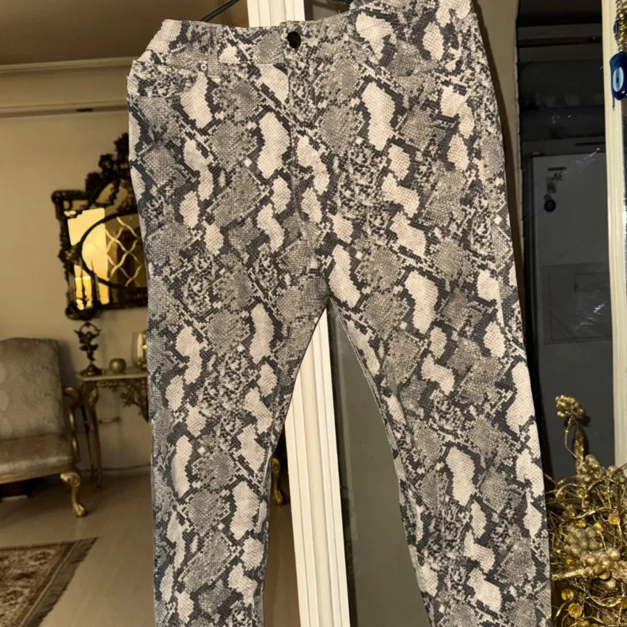 شلوار پوست ماری h&m