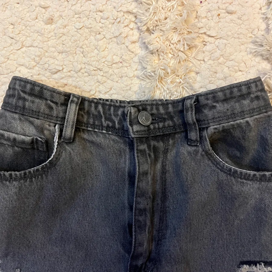 شلوار جین خاکستری طوسی