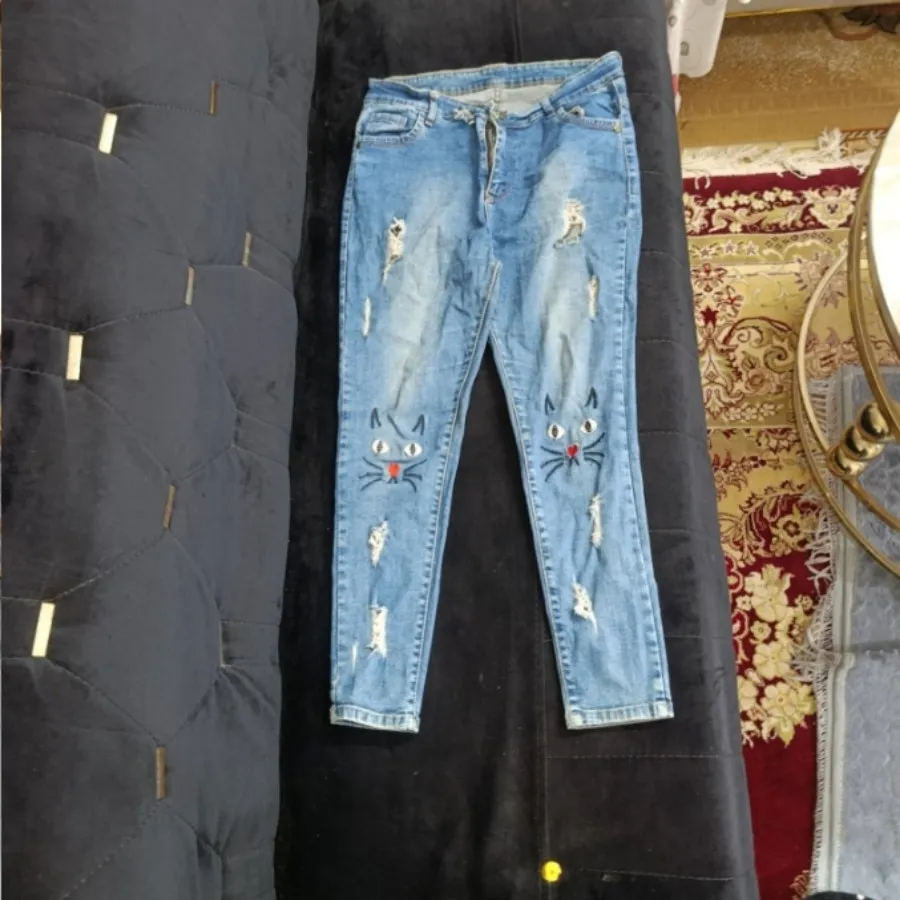 شلوار جین گربه ای