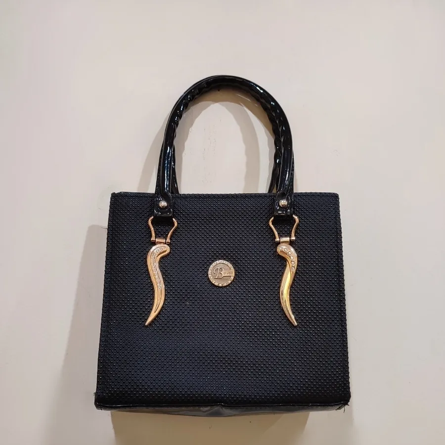 کیف چرم ورنی