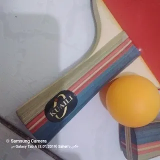 یک جفت راکت تنیس به همراه