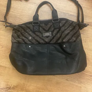 کیف xti