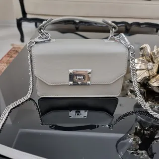 کیف طوسی و نقره ای