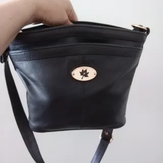 کیف نوین چرم مدل خورشید