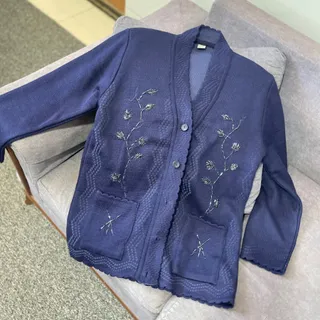 ژاکت مهره کار شده