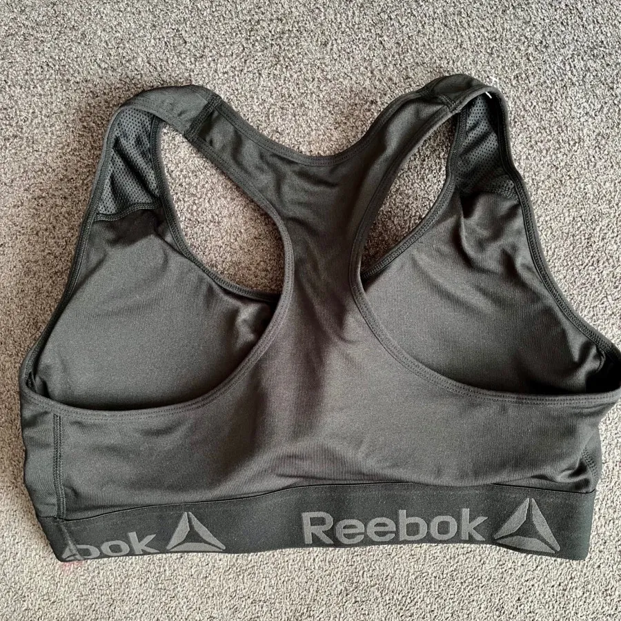نیم‌تنه ورزشی Reebok