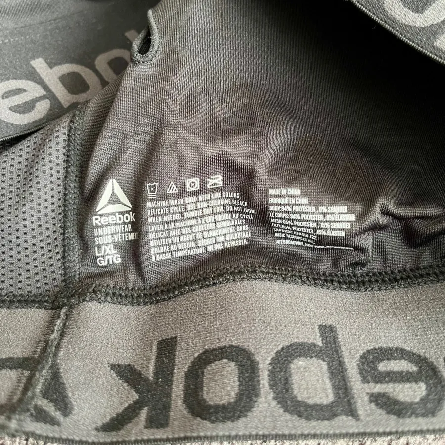 نیم‌تنه ورزشی Reebok