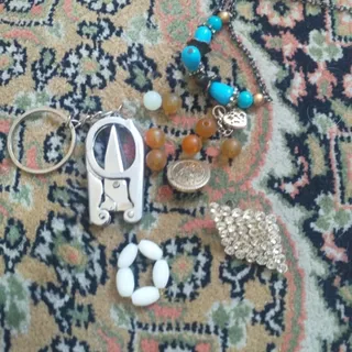 زنجیر و حلقه گل سینه حلقه