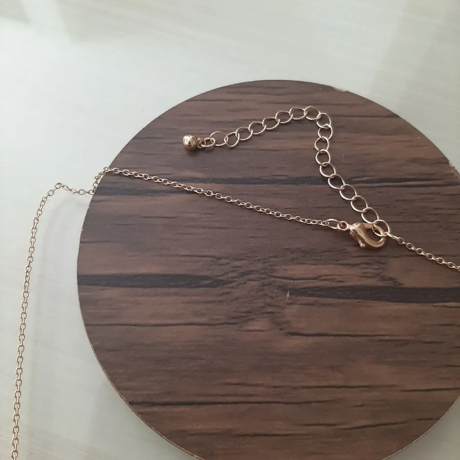 گردنبند طرح گل و مروارید