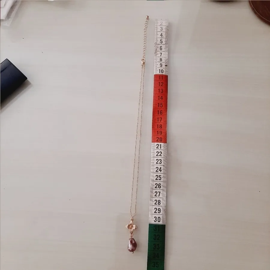 گردنبند طرح گل و مروارید