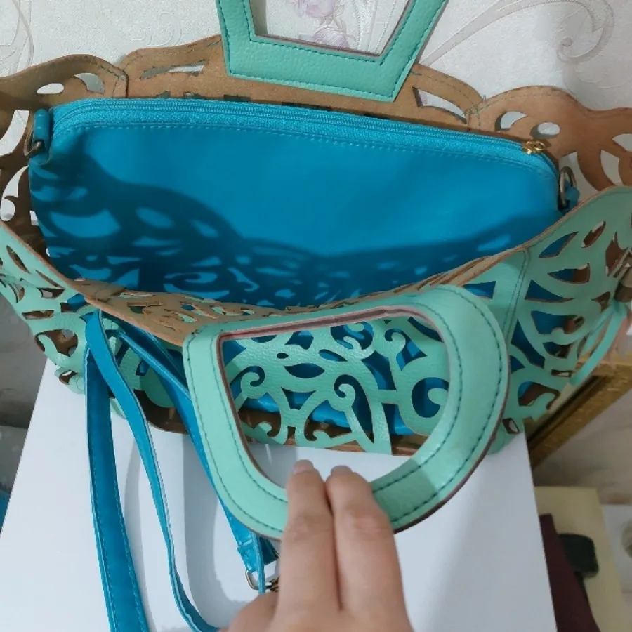کیف چرمی برش خورده فیروزه