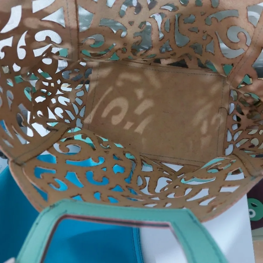 کیف چرمی برش خورده فیروزه