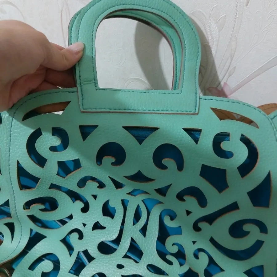 کیف چرمی برش خورده فیروزه