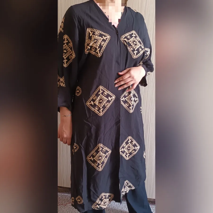 مانتو مشکی ابر و بادی
