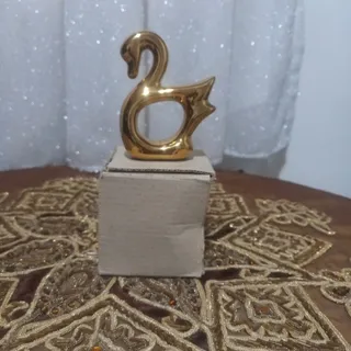 مجسمه وحلقه دستمال سفره