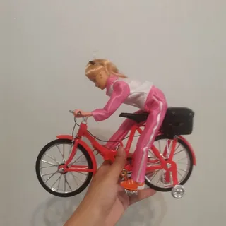 عروسک دوچرخه سوار