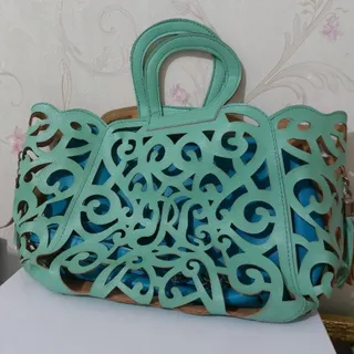 کیف چرمی برش خورده فیروزه