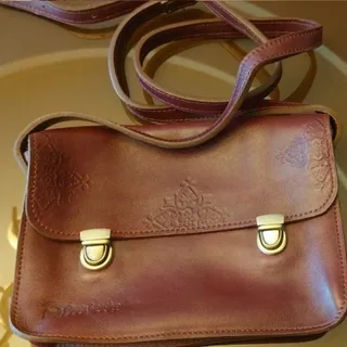 کیف چرم زرشکی