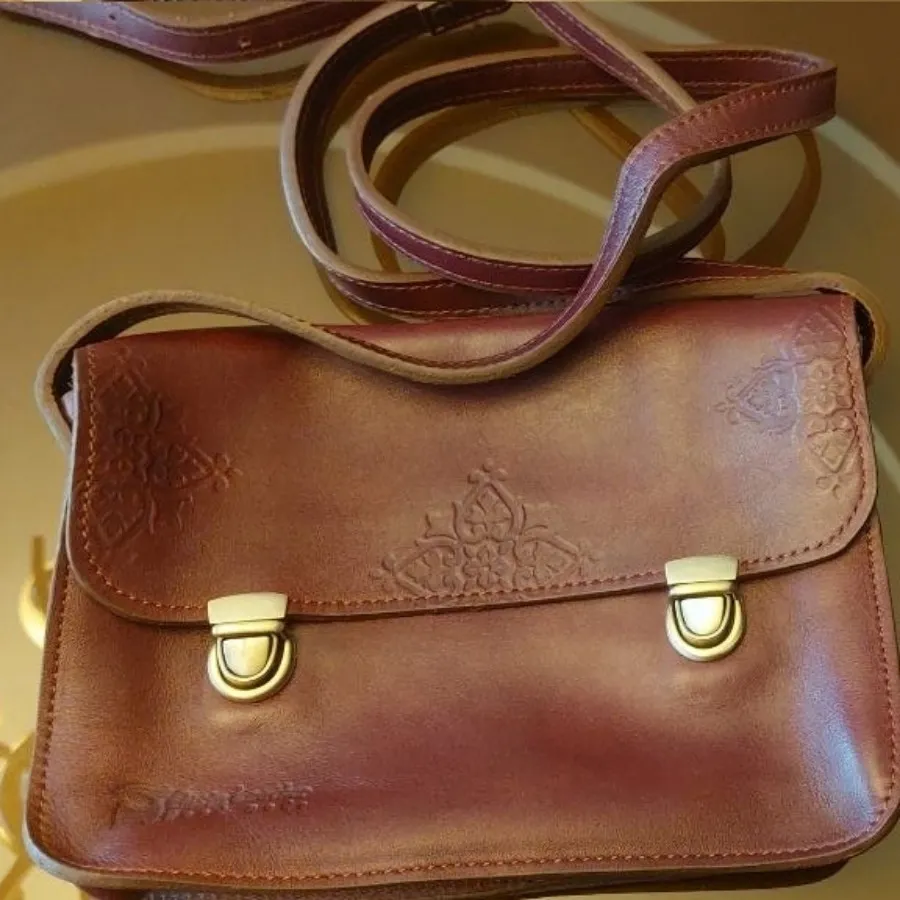 کیف چرم زرشکی