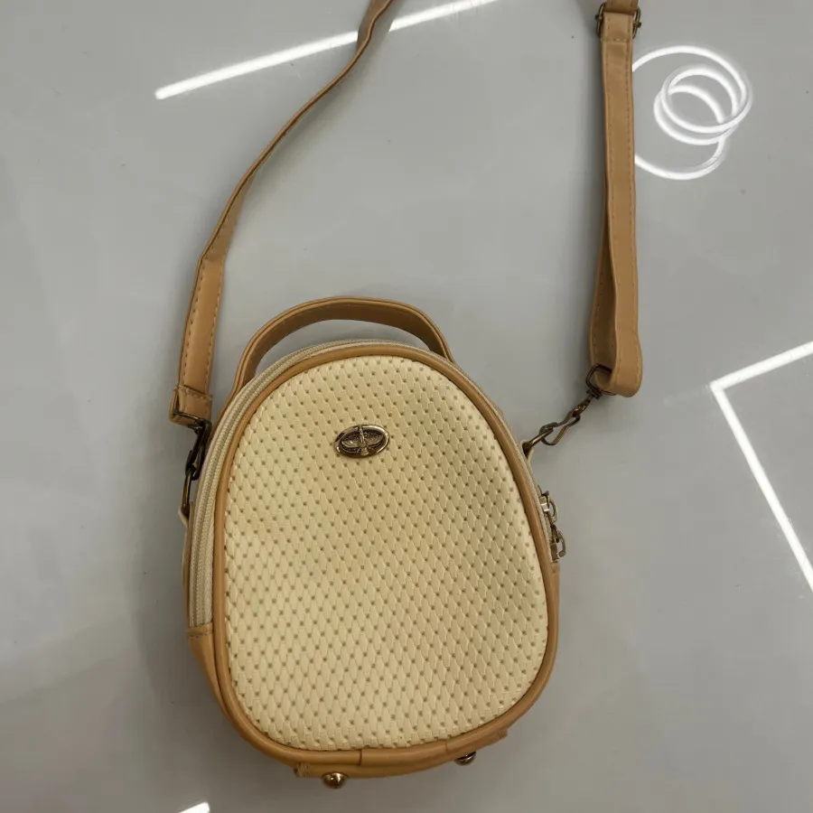 کیف کوچیک کرم