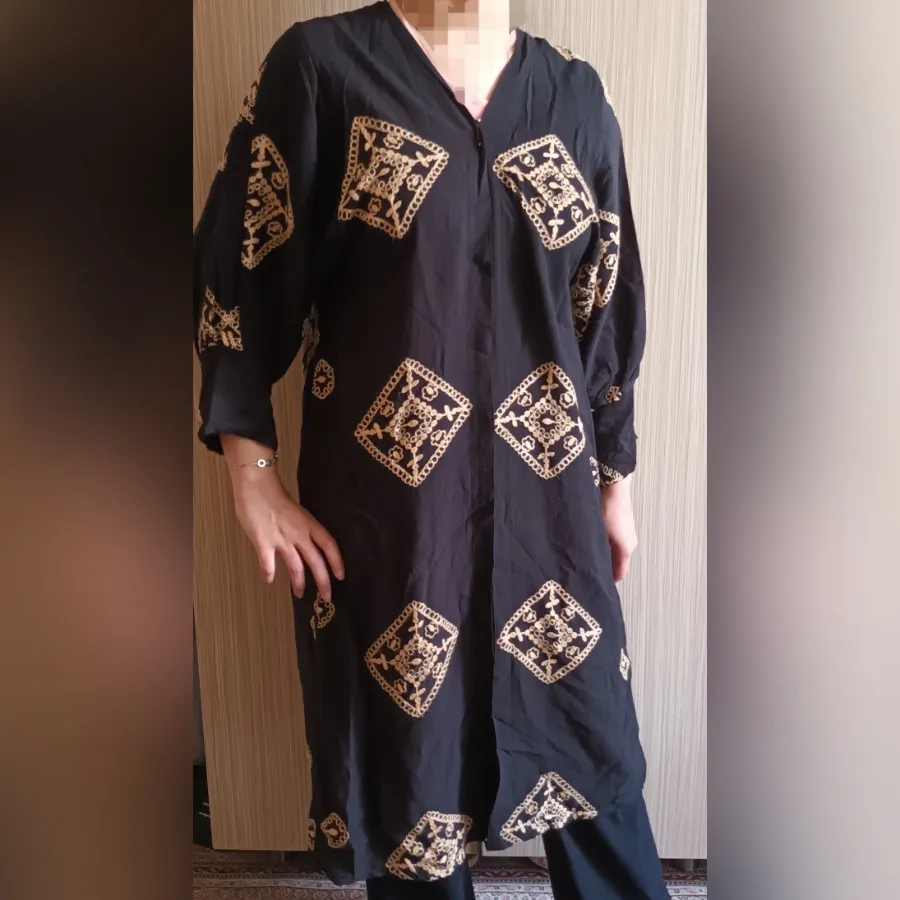 مانتو مشکی ابر و بادی