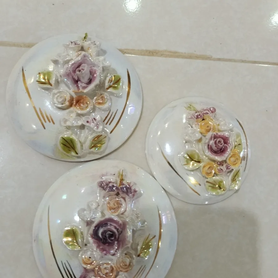 دیوارکوب نقش برجسته
