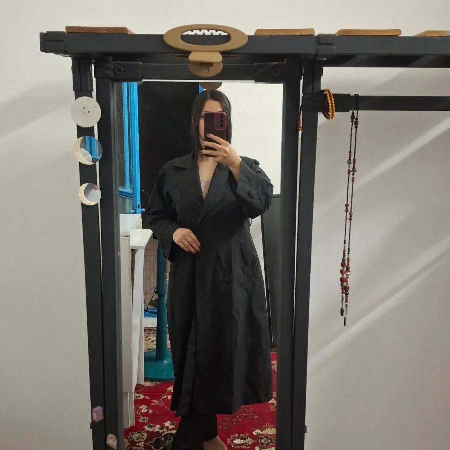 کت بلند بارانی