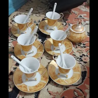 قهوه خوری طلایی با شکردان