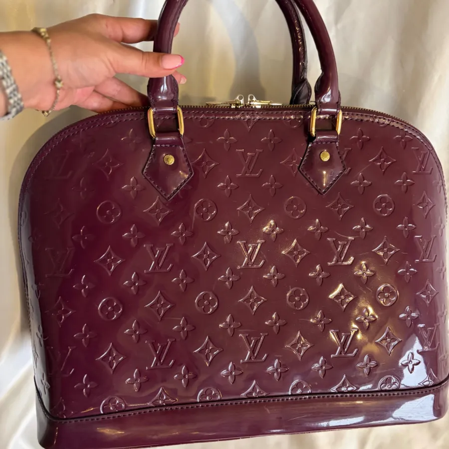 کیف شرابی Louis vuitton