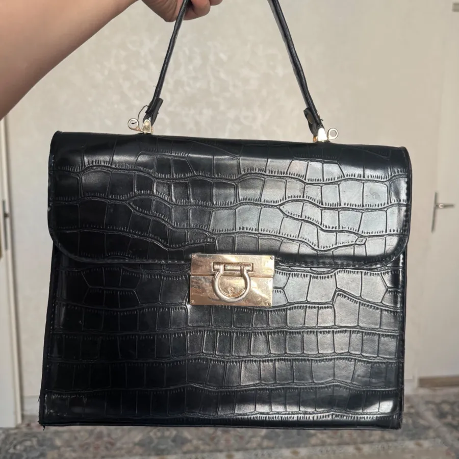 کیف چرم مشکی