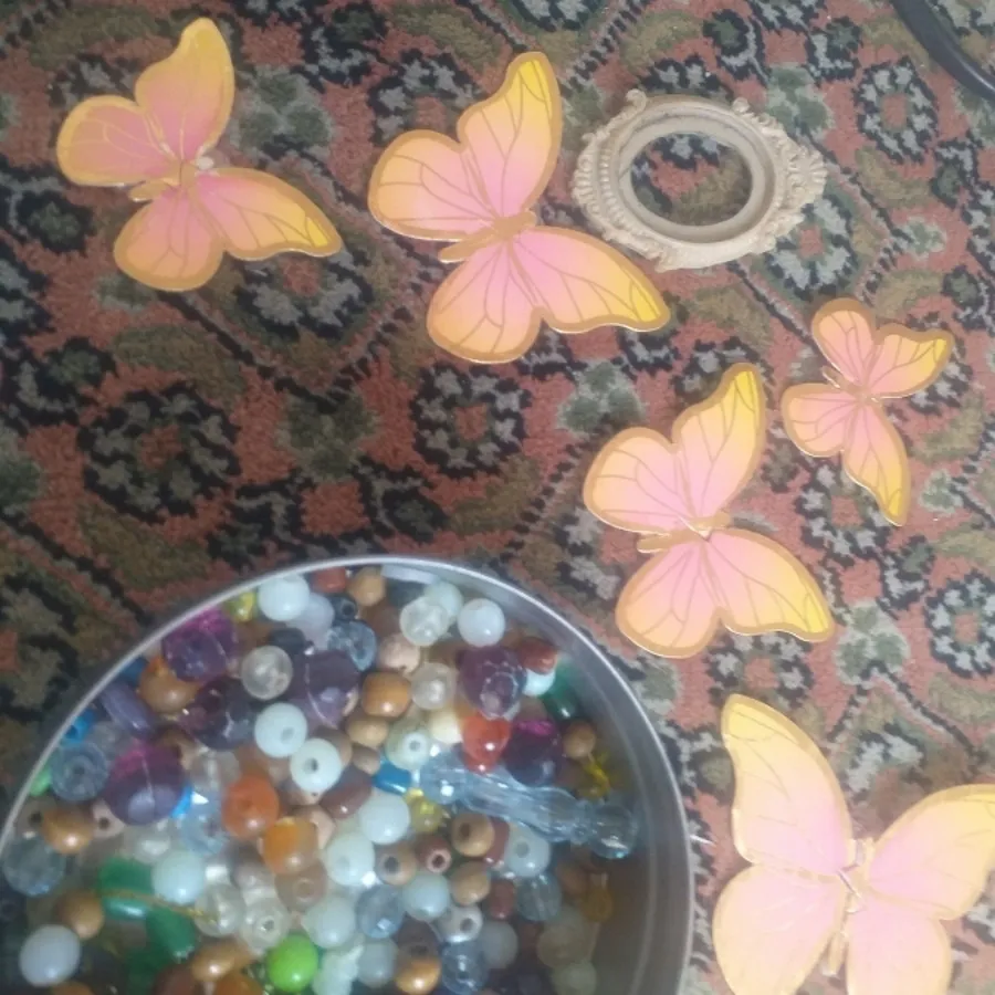 مهره گردنبند وپروانه