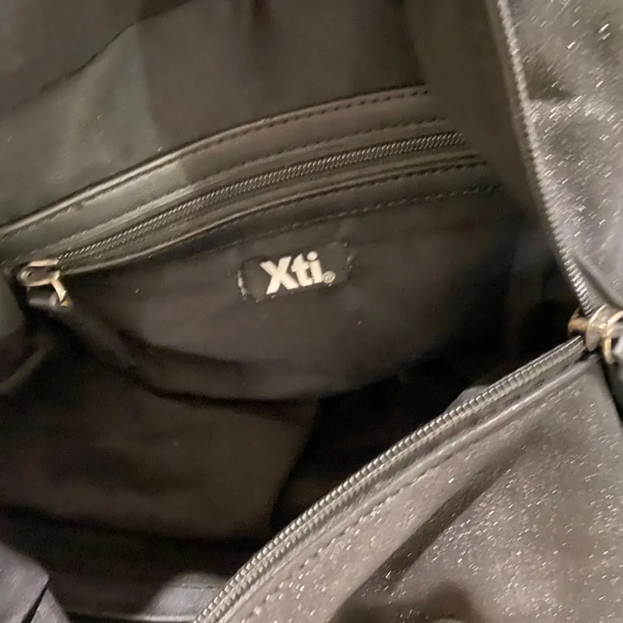 کیف xti